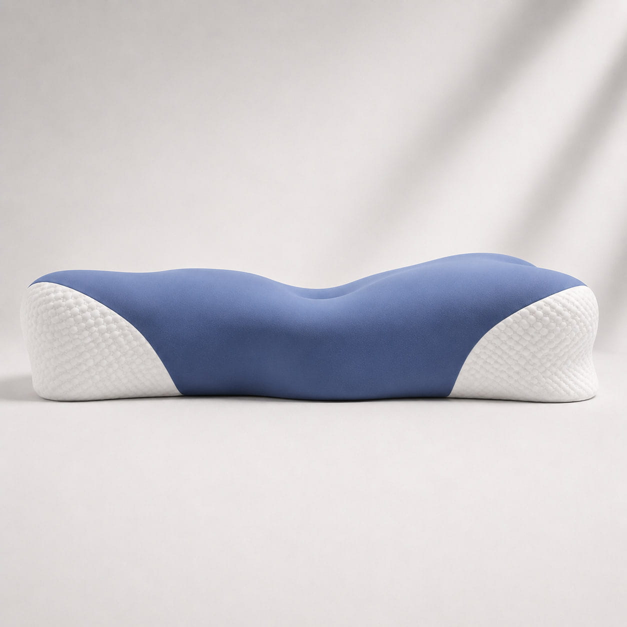 Side profile of the Oasisleep Solace Pillow showing contour height and cervical support design